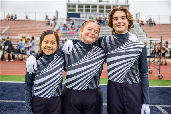 Summit High band members smile
